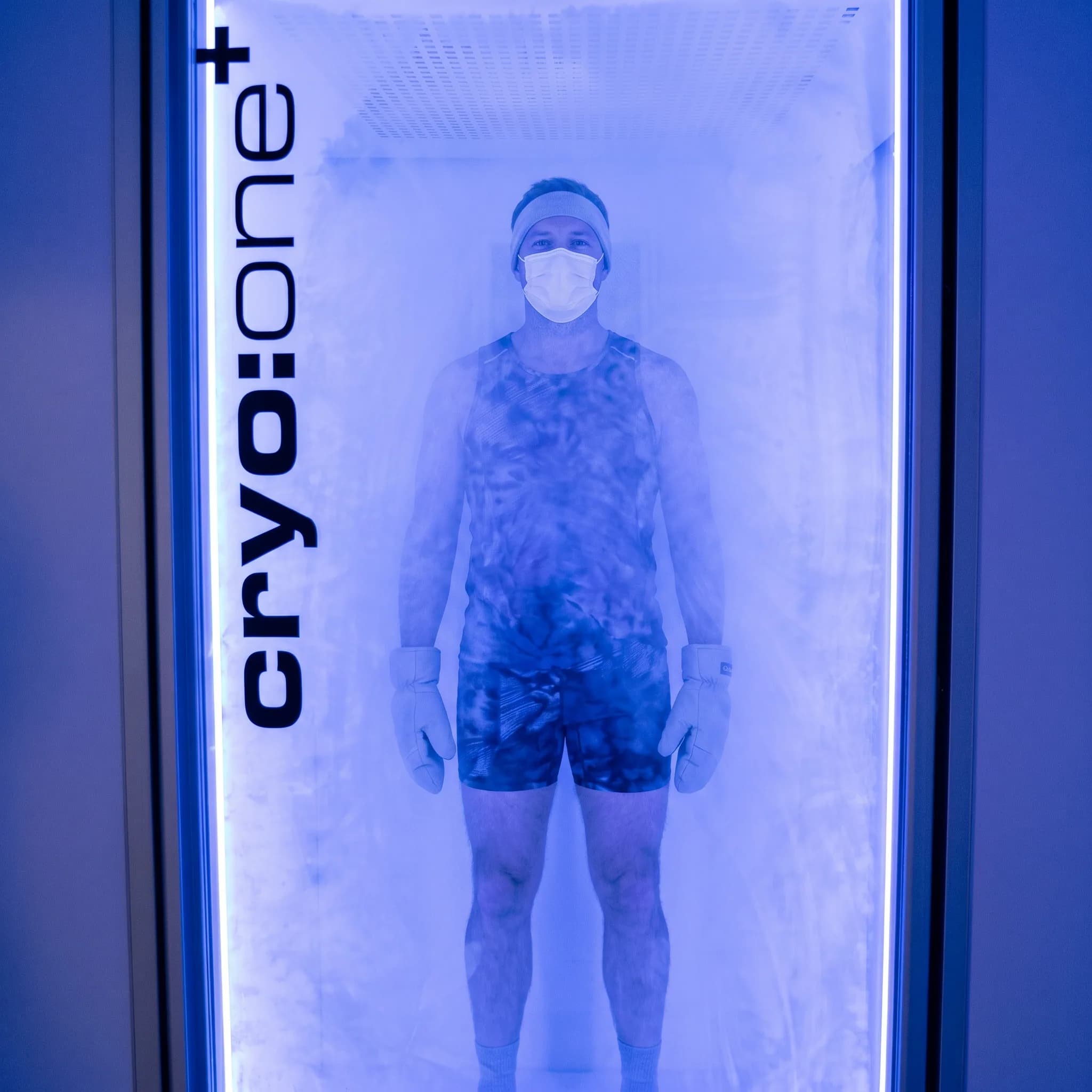 Man standing inside the cryotherapy chamber during cold exposure
